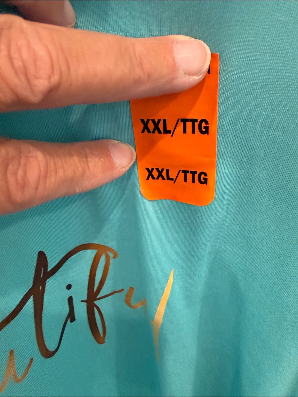 Turquoise Graphic Tee with Gold Script